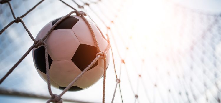 Soccer into goal success concept