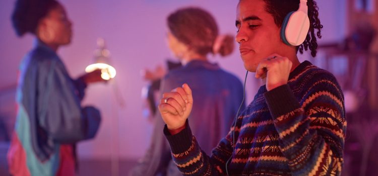 young-man-dancing-with-headphones-on-at-silent-dis-2023-11-27-04-56-42-utc