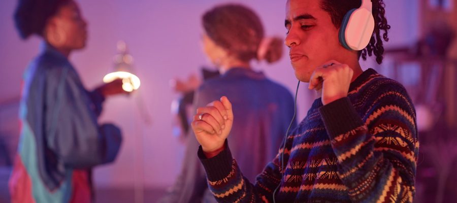 young-man-dancing-with-headphones-on-at-silent-dis-2023-11-27-04-56-42-utc